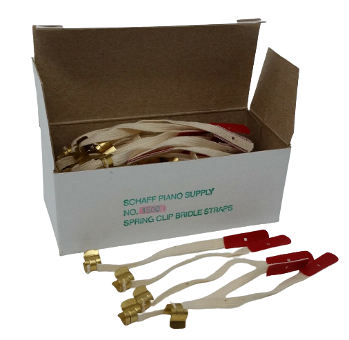 A box of piano bridle straps with gold spring clips, with the straps displayed in front of the box. The straps are white regulation braid with red Fabrilite tips. (In Tune Piano Supply | Everett Piano Services)